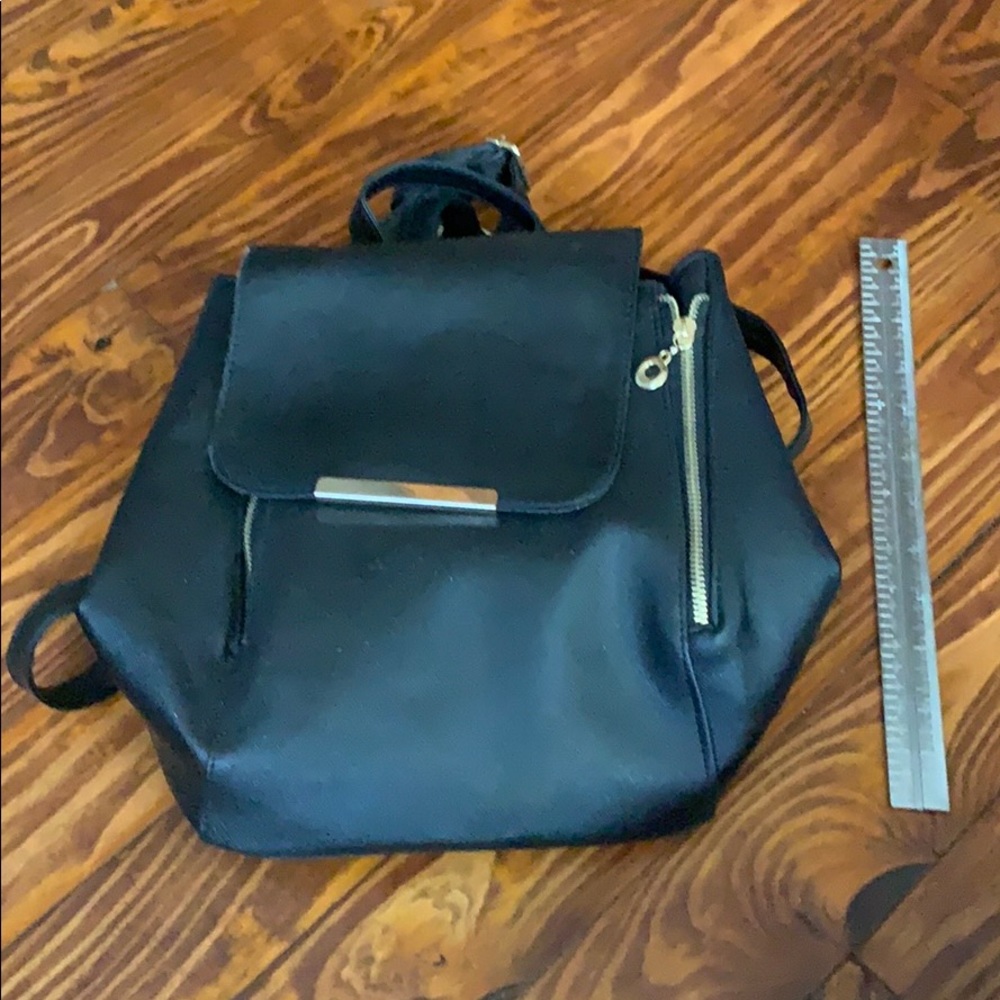 Nwt gold and black backpack
